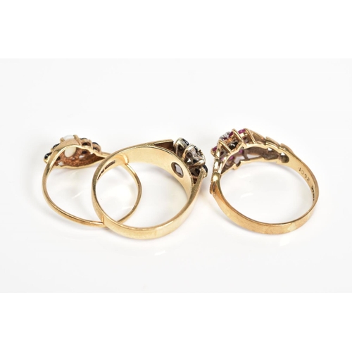 52 - THREE 9CT GOLD GEM SET RINGS, to include a diamond and sapphire cluster ring with a 9ct hallmark for... 