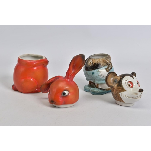 553 - AN EARLY 20TH CENTURY PORCELAIN 'MICKEY MOUSE' JAR AND COVER, with red eyes and smiling mouth showin... 