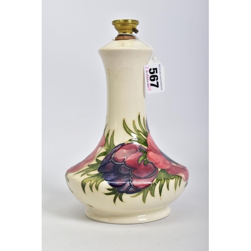 567 - A MOORCROFT POTTERY BALUSTER TABLE LAMP, cream ground with pink/purple anemone design, printed blue ... 