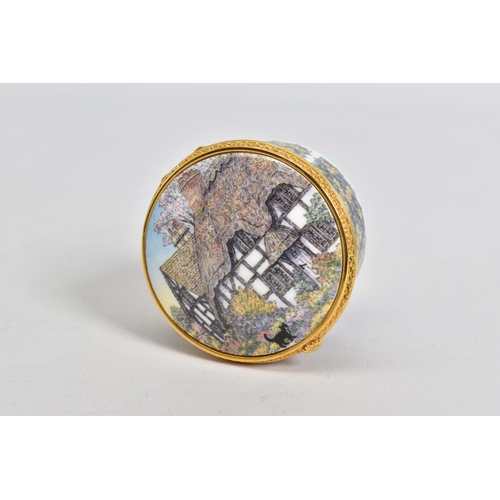 571 - A ROYAL WORCESTER 'THE CONNOISSSEUR COLLECTION WORCESTERSHIRE COTTAGE', circular pill box, gilt meta... 