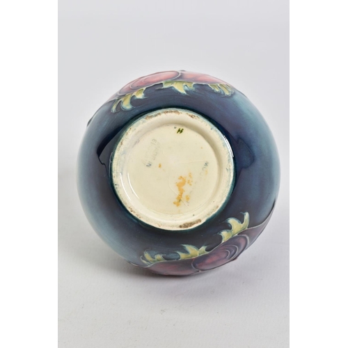 573 - A MOORCROFT POTTERY SQUAT BALUSTER VASE, mottled blue ground with pink/purple anemone design, impres... 