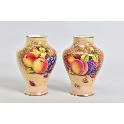 577 - A PAIR OF SMALL ROYAL WORCESTER FRUIT PAINTED BALUSTER VASES, signed R.Price, shape No, 2491/4, prin... 