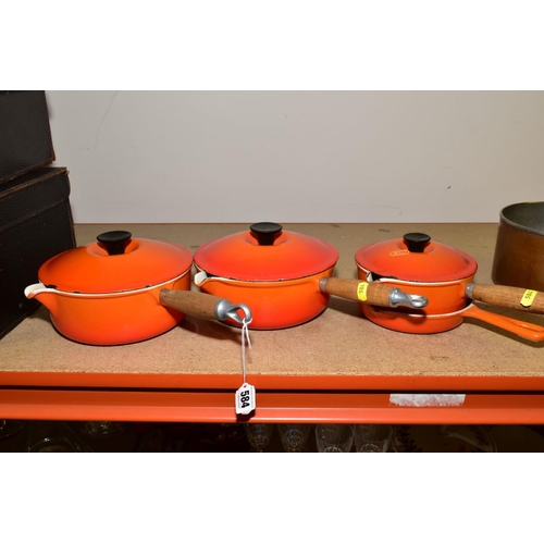 584 - THREE LE CREUSET ORANGE ENAMEL SAUCEPANS AND LIDS, two 20cm and one 16cm and a Le Creuset frying pan... 