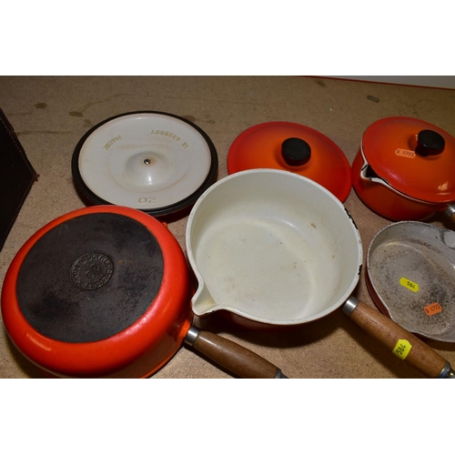 584 - THREE LE CREUSET ORANGE ENAMEL SAUCEPANS AND LIDS, two 20cm and one 16cm and a Le Creuset frying pan... 