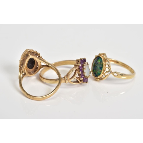 59 - A SELECTION OF GEM SET RINGS, to include an opal and amethyst cluster ring, with open work shoulders... 