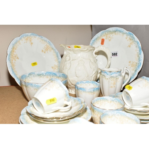 592 - A WILEMAN FOLEY CHINA PART TEA SET, transfer printed blue and sepia floral design, comprising a pair... 