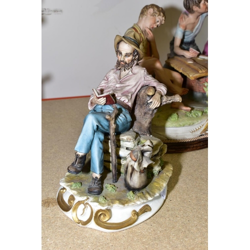 603 - THREE CAPODIMONTE PORCELAIN FIGURES, comprising a tableau group of children playing cards, signed G.... 