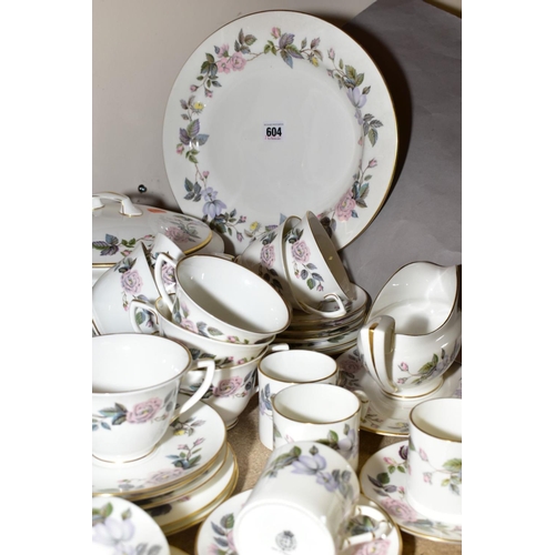 604 - A ROYAL WORCESTER 'JUNE GARLAND' PATTERN PART DINNER SERVICE, comprising two tureens and covers, an ... 