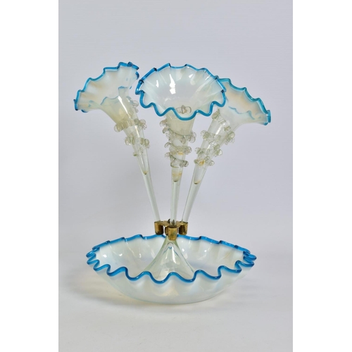 626 - A LATE VICTORIAN BLUE, VASELINE AND CLEAR GLASS EPERGNE, three trumpets, frilled rims and with crimp... 