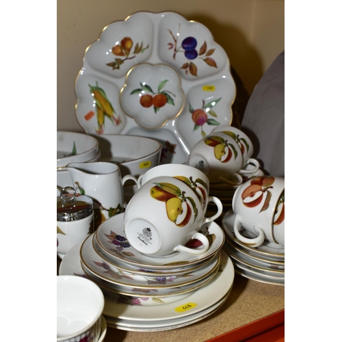 648 - A QUANTITY OF ROYAL WORCESTER 'EVESHAM' PATTERN DINNER AND COOKWARE, including eleven dinner plates,... 