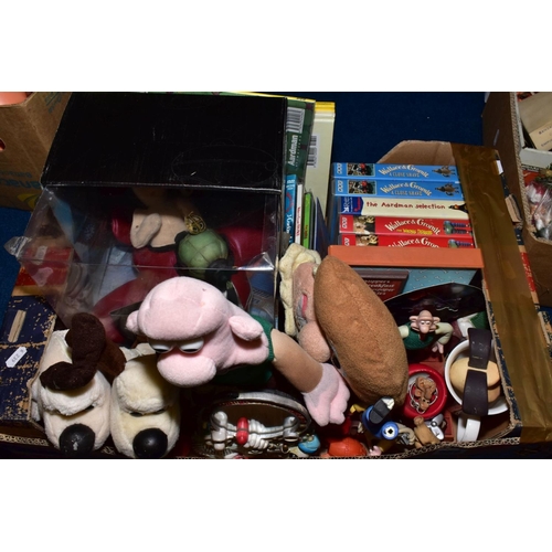 669 - FOUR BOXES OF WALLACE & GROMIT THEMED NOVELTIES, GAMES, SOFT TOYS, VIDEOS, BOOKS, etc, to include vi... 