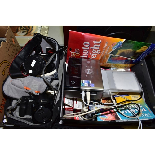 680 - A TRAY CONTAINING DIGITAL CAMERAS AND PHOTO PRINTING EQUIPMENT, including a Canon EOS 500D fitted wi... 