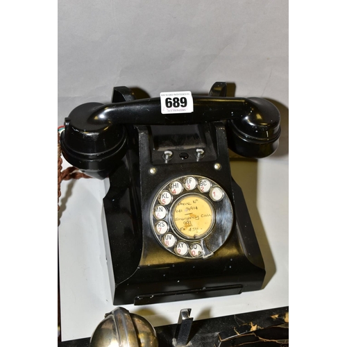 689 - A G.P.O. ERICSSON BLACK BAKELITE TELEPHONE, model 328L, version with dummy tray front, minor damage ... 