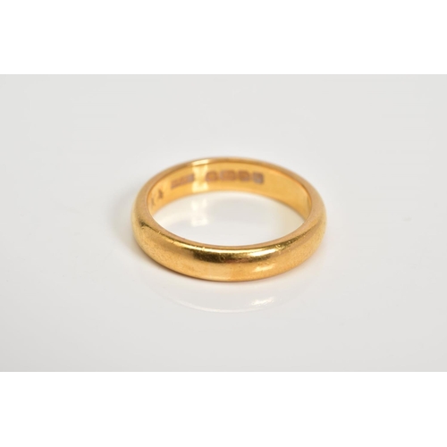 69 - A 22CT GOLD WEDDING BAND, the plain polished band with a 22ct hallmark for Birmingham, ring size L, ... 