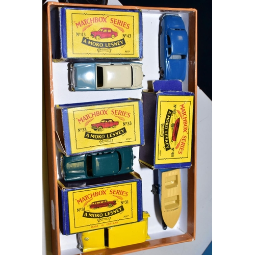 698 - FOUR BOXED MATCHBOX 1-75 SERIES DIECAST VEHICLES, Ford Station Wagon, No 31 yellow body, metal wheel... 