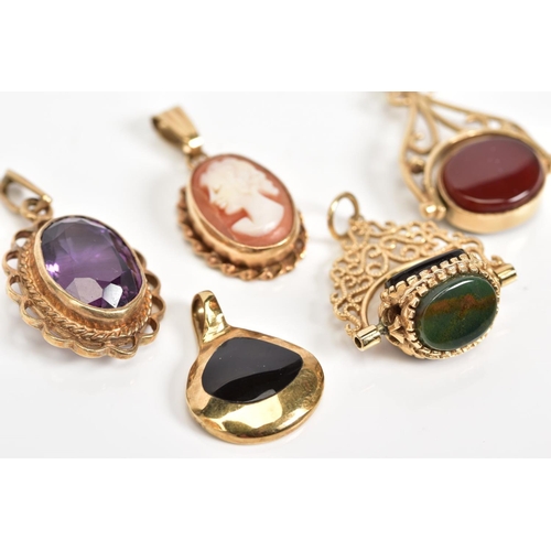 7 - A SELECTION OF FIVE 9CT GOLD PENDANTS, to include two scroll detailed swivel fobs set with semi prec... 