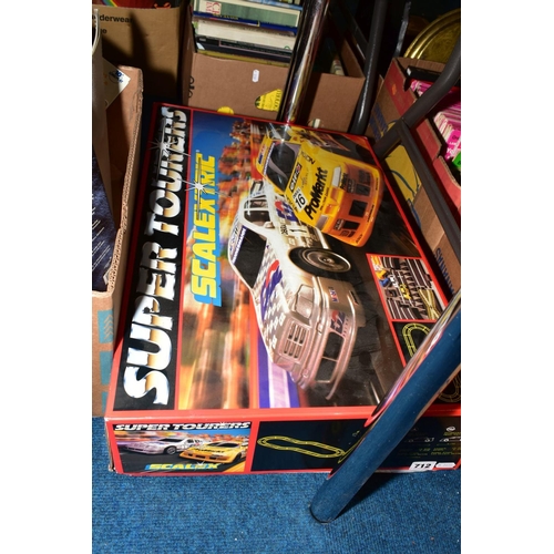 712 - A BOXED SCALEXTRIC SUPER TOURERS RACING SET, No.C1000, appears complete with both cars, track, hand ... 