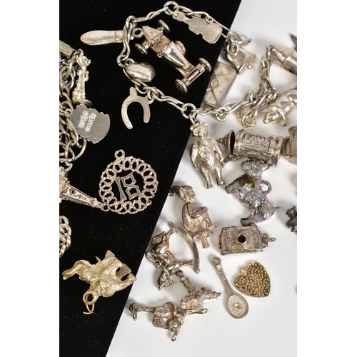 90 - A SMALL SELECTION OF CHARM BRACELETS AND CHARMS, to include a charm bracelet with heart clasp and sa... 