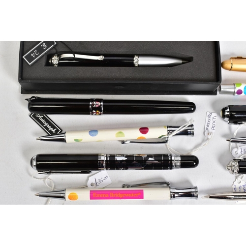 92 - A SELECTION OF PENS, to include a black fountain pen with a picture of a map, with matching ballpoin... 