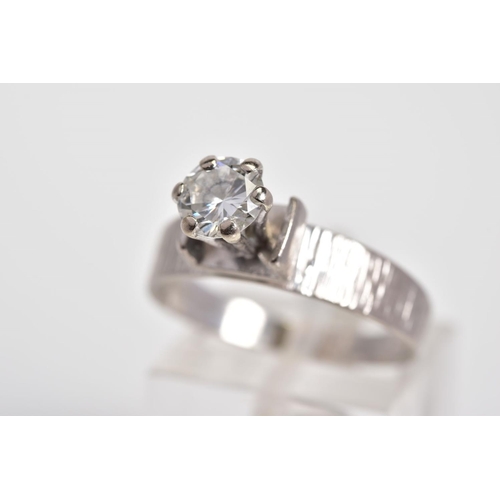 96 - A SINGLE STONE DIAMOND RING, a claw set round brilliant cut diamond within a raised mount, total est... 