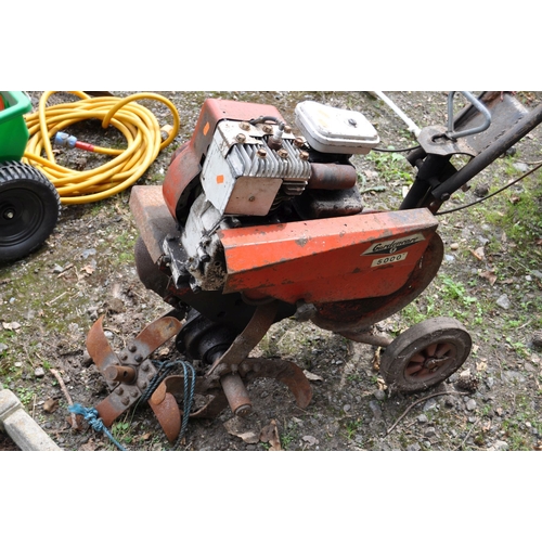 1016 - A VINTAGE GARDENCARE 5000 PETROL GARDEN TILLER, with a Briggs & Stratton engine with two 35cm tillin... 