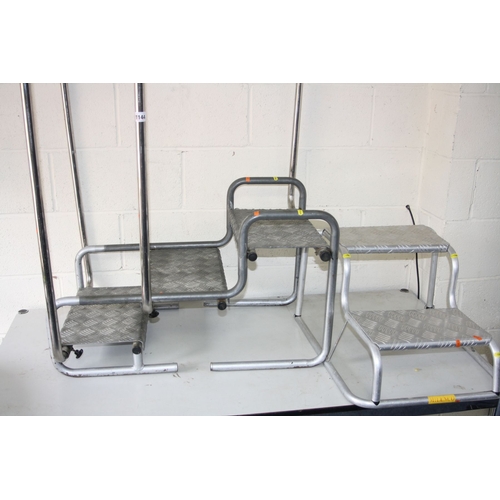 1151 - A SET OF CARAVAN STEPS WITH HANDRAILS, and another smaller set, together with an aluminium rotating ... 