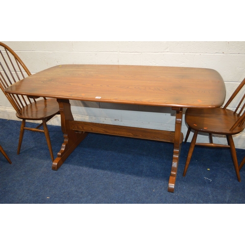 1329 - AN ERCOL GOLDEN DAWN ELM REFECTORY TABLE, width 153cm x depth 85cm x height 73cm and five high spind... 