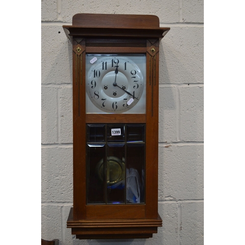 1340 - A FRENCH WALNUT WALL CLOCK, with Westminster chime, together with an early to mid 20th Century oak w... 