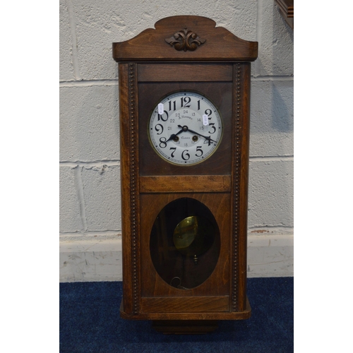 1340 - A FRENCH WALNUT WALL CLOCK, with Westminster chime, together with an early to mid 20th Century oak w... 