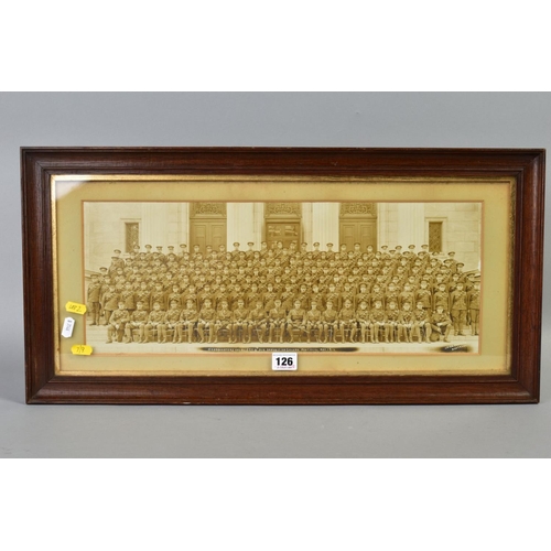 126 - A LARGE GLAZED PERIOD FRAME, approximately 64cm x 32cm, containing a mounted sepia photograph, in la... 