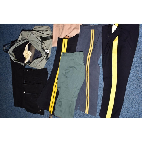132 - A BLUE MILITARY STYLE KIT BAG, containing a number of military style Police and Civil uniform trouse... 