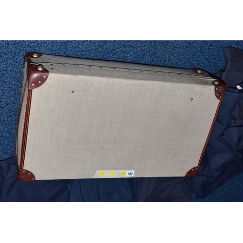 133 - A SUITCASE FULL OF WOMENS AIR FORCE BLUE WOOLLEN SKIRTS, all appear good condition and post WWII