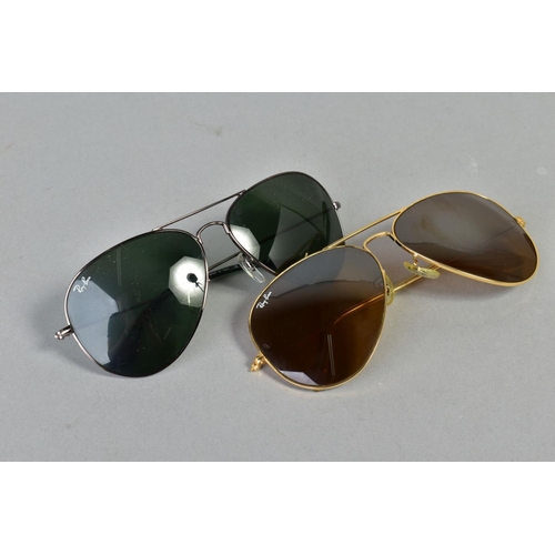 136 - TWO PAIRS OF RAY-BAN SUNGLASSES, both of aviator design, the first with a black frame and dark lense... 