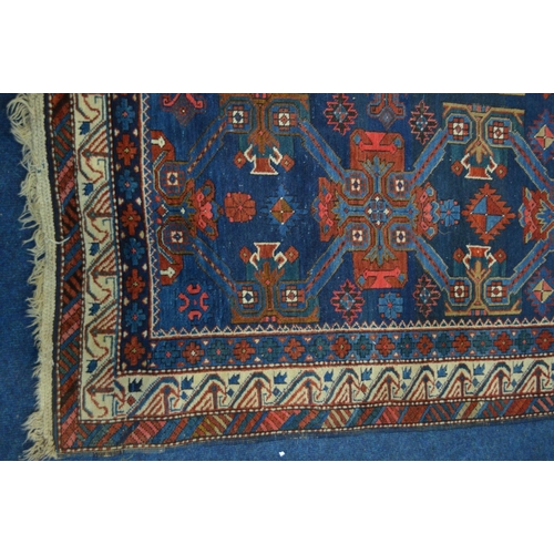 1365 - A LATE 19TH CENTURY EAGLE RAZAK BLUE GROUND RUG, the middle field with eight medallions framed by a ... 