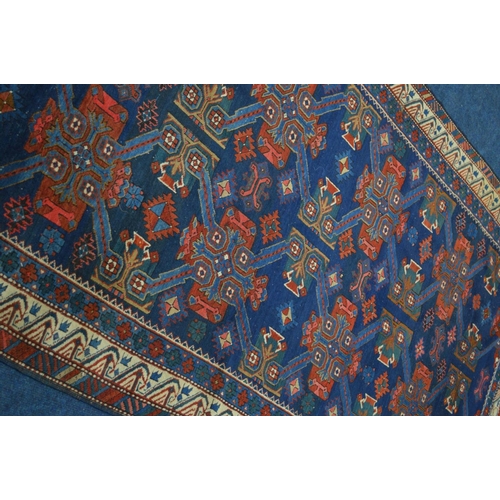 1365 - A LATE 19TH CENTURY EAGLE RAZAK BLUE GROUND RUG, the middle field with eight medallions framed by a ... 
