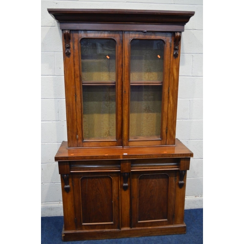 1368 - A VICTORIAN WALNUT GLAZED DOUBLE BOOKCASE, on a married base with two drawers, width 121cm x depth 4... 