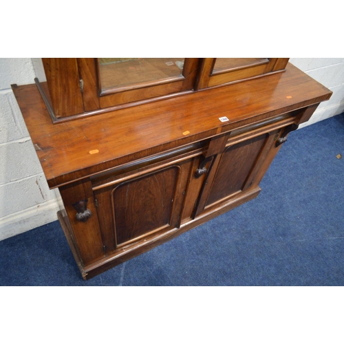 1368 - A VICTORIAN WALNUT GLAZED DOUBLE BOOKCASE, on a married base with two drawers, width 121cm x depth 4... 