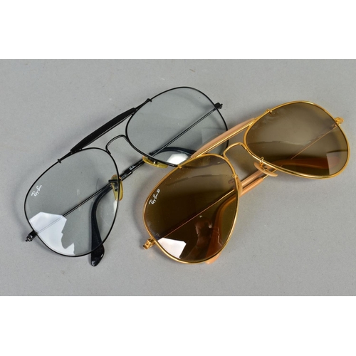 137 - TWO PAIRS OF RAY-BAN GLASSES, both of out doorsmandesign, the first with a black frame and clear len... 