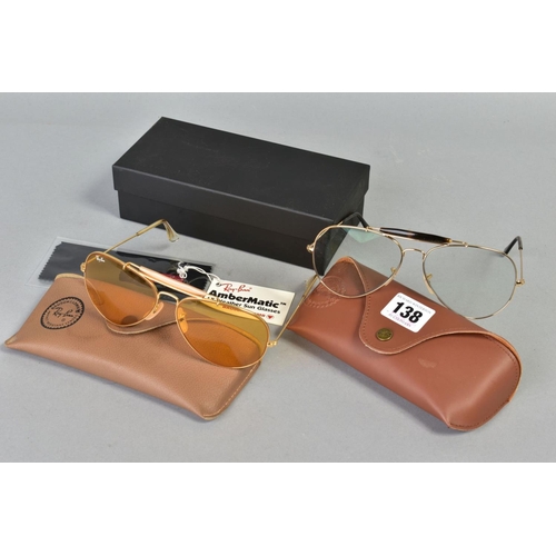 138 - TWO PAIRS OF RAY-BAN GLASSES, both of out doorsmandesign, the first with a gold coloured frame and c... 