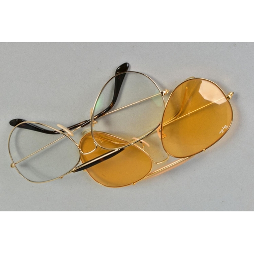 138 - TWO PAIRS OF RAY-BAN GLASSES, both of out doorsmandesign, the first with a gold coloured frame and c... 