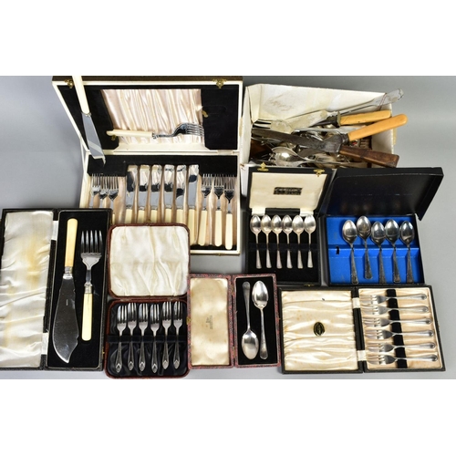 140 - A LARGE SELECTION OF FLATWARE AND CUTLERY, to include eleven white metal knives with imitation ivory... 