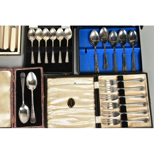 140 - A LARGE SELECTION OF FLATWARE AND CUTLERY, to include eleven white metal knives with imitation ivory... 