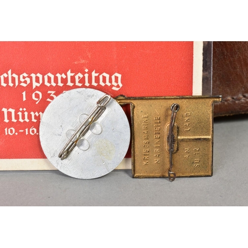 141 - A NUMBER OF WWII GERMAN ITEMS AS FOLLOWS:- two x Reichspateitag Propoganda postcards Nurnberg 1935, ... 