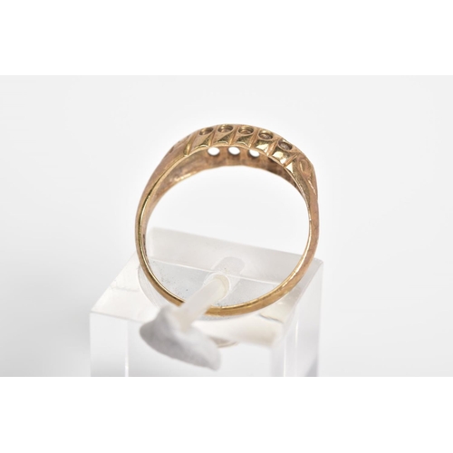 19 - AN EARLY 20TH CENTURY 9CT GOLD, RUBY AND DIAMOND BOAT RING, set with a central single cut diamond in... 