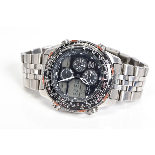 29 - A GENTLEMENS CITIZEN WORLD TIME CHONOGRAPH PROMASTER WRISTWATCH, with a black multi functional dial,... 