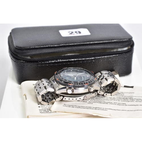 29 - A GENTLEMENS CITIZEN WORLD TIME CHONOGRAPH PROMASTER WRISTWATCH, with a black multi functional dial,... 