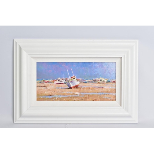 302 - HELIOS GISBERT (SPAIN 1958) 'ON THE BEACH', boats on the beach at low tide, oil on board, signed bot... 
