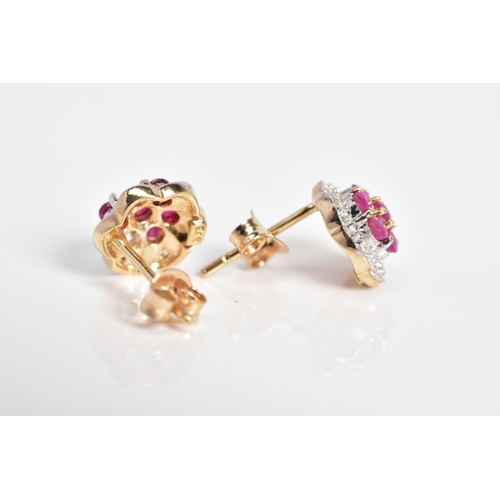 5 - A NEAR PAIR OF MATCHING  9CT GOLD RUBY AND DIAMOND CLUSTER EARRINGS, each cluster set with circular ... 