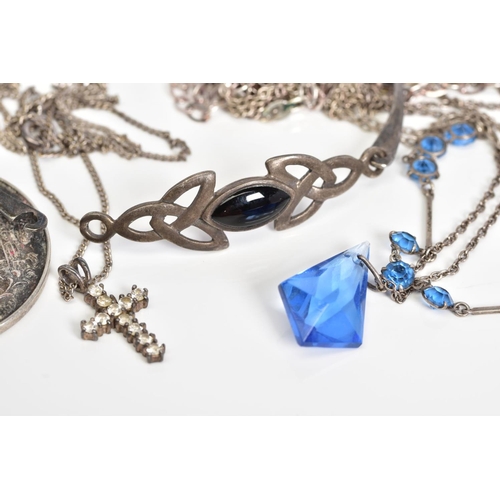 54 - A SELECTION OF JEWELLERY, to include a Celtic silver hinged bangle with a black enamel panel to fron... 