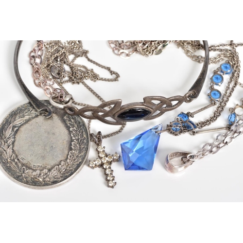 54 - A SELECTION OF JEWELLERY, to include a Celtic silver hinged bangle with a black enamel panel to fron... 